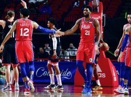 Tobias Harris and Joel Embiid celebrate a victory over the Houston Rockets to keep their winning streak alive. (Image: Suzanne Greenburg/Getty)