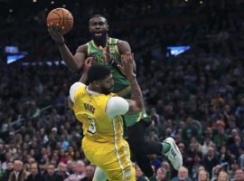 Boston Celtics guard Jaylen Browns drives to the hoop against LA Lakers center Anthony Davis in a blowout at TD Garden in Boston. (Image: Charles Krupa/AP)