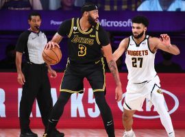 Denver Nuggets guard Jamal Murray (eight) defends Anthony Davis of the LA Lakers. (Image: Porter Lambert/Getty)