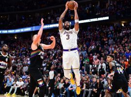 Lakers center Anthony Davis drives to the basket against the Denver Nuggets at the Pepsi Center in Denver, CO. (Image: Ron Chenoy/USA Today Sports)