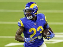 Running back Cam Akers rushes for a first down for the Los Angeles Rams against the New England Patriots at SoFi Stadium. (Image: Ashley Landis/AP)