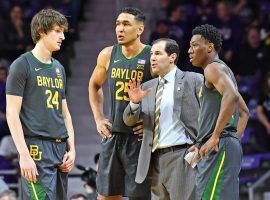 Baylor Bears head coach Scott Drew advises his team during a time out in a recent game against Kansas State. (Image: Peter Aiken/Getty)