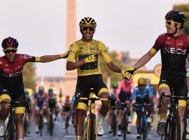 Egan Bernal, flanked by teammates from Ineos Grenadiers, enters Paris in 2019 en route to his first victory at the Tour de France. (Image: Anne-Christine Pouhoulat/Getty)