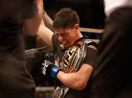 Brandon Moreno won the UFC flyweight title on Saturday night, and says he wants to defend it before the end of the year. (Image: Christian Petersen/Getty)