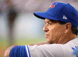 LOS ANGELES, CALIFORNIA - AUGUST 21:  Manager Charlie Montoyo #25 of the Toronto Blue Jays looks on to the field during the first inning against the Toronto Blue Jays at Dodger Stadium on August 21, 2019 in Los Angeles, California. (Photo by Harry How/Getty Images)