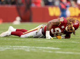 Chase Young from the Washington Football Team moments after his knee injury against the Tampa Bay Bucs at FedEx Field in Landover, MD. (Image: Getty)