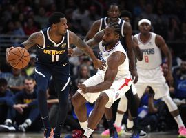 Denver Nuggets point guard Monte Morris defended by LA Clippers forward Kawhi Leonard at the Pepsi Center in Denver. (Image: Harry How/Getty)