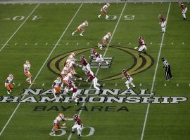 Officials have discussed delaying the College Football Playoff due to the COVID-19 pandemic, but are only considering it as a possible scenario for now. (Image: Jeff Chiu/AP)