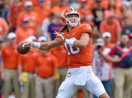 Multiple reports say that the Power 5 conferences might postpone the fall college football season, though players like Trevor Lawrence are arguing to keep the season as is. (Image: Richard Shiro/AP)