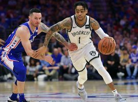 The Brooklyn Nets D'Angelo Russell drives by Philadelphia 76ers guard JJ Redick during Game 1 of the playoffs at Wells Fargo Center in Philadelphia, PA. (Image: Getty)