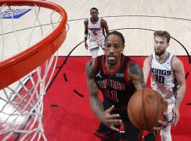 DeMar DeRozan from the Chicago Bulls scoops a layup against the Sacramento Kings during his sizzling scoring run. (Image: Jeff Haynes/Getty)