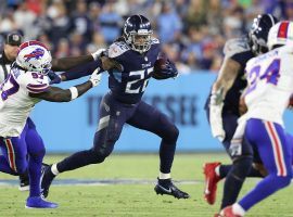 Derrick Henry from the Tennessee Titans looks for a hole against the Buffalo Bills in Week 6. (Image: Harold Hood/Getty)