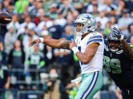 Dak Prescott, QB of the Dallas Cowboys, avoids a sack against the Seahawks in Week 3. (Image: Abbie Parr/Getty)