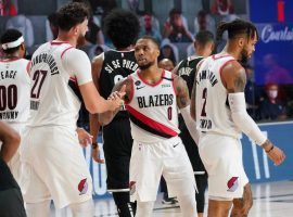 Portland Trail Blazers All-Star Damian Lillard advises a teammate against the Brooklyn Nets at Disney World of Sports in Kissimmee, Florida. (Image: AP)