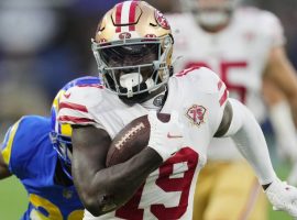 Deebo Samuel from San Francisco 49ers scampers for a touchdown against the LA Rams in the NFC Championship at SoFi Stadium in Inglewood. (Image: Getty)