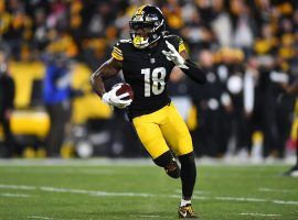 Diontae Johnson from the Pittsburgh Steelers secures a first down against the Baltimore Ravens in Week 13. (Image: Joe Sargent/Getty)