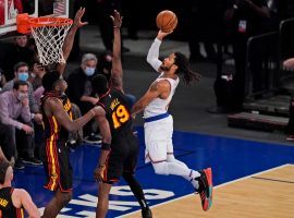 Derrick Rose of the New York Knicks penetrates the paint against Tony Snell of the Atlanta Hawks in Game 1 of the opening-round of the Eastern Conference playoffs. (Image: Peter Carini/Getty)