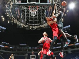 Minnesota Timberwolves rookie Anthony Edwards elevates for a dunk against Toronto Raptors forward Yuta Watanabe at the Target Center in Minneapolis, Minnesota. (Image: David Sherman/Getty)