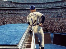 Elton John during a concert at Dodger Stadium in Los Angeles in 1975. (Image: Getty)