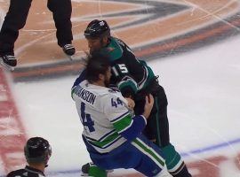 Vancouver Canucks defenseman Erik Gudbranson (left) and Anaheim Ducks captain Ryan Getzlaf tussle in the second period at the Pond in Anaheim, CA. (Image: YouTube)