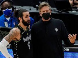 Minnesota Timberwolves point guard Ricky Rubio and new head coach Chris Finch have a quick on-court discussion during the T-Wolvesâ€™ recent losing streak. (Image: Dave Algonquin/Getty)