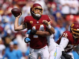 Washington Football Team quarterback Ryan Fitzpatrick is sacked by Uchenna Nwosu from the LA Chargers at FedEx Stadium in Landover, MD. (Image: USA Today Sports)