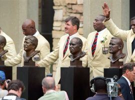 From left to right, Billy Shaw, Eric Dickerson, Tom Mack, Ozzie Newsome and Lawrence Taylor take part in the 1999 Pro Football Hall of Fame induction ceremony. (Image: KRT)