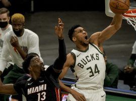 Giannis 'Greek Feak' Antetokounmpo of the Milwaukee Bucks elevates over Bam Adebayo from the Miami Heat. (Image: Getty)