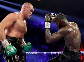 Tyson Fury (left) says he is done waiting for a third fight with Deontay Wilder (right) and will take on a different opponent in December. (Image: Al Bello/Getty)