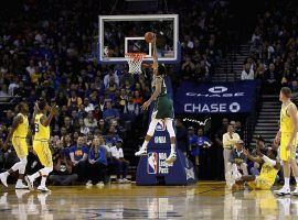 Giannis "Greek Freak" Antetokounmpo from the Milwaukee Bucks throws down a dunk against the Warriors. (Image: Ezra Shaw/Getty)