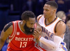 Ex-Oklahoma City Thunder guard Russell Westbrook (right) guards James Harden of the Houston Rockets during a 2018 game in Oklahoma City. (Image: Alonzo Adams/AP)