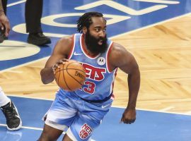 James Harden, seen here at Barclay's Center, grabs a rebound in his debut with the Brooklyn Nets that included a 32-point triple-double. (Image: Wendell Crus/USA Today Sports)