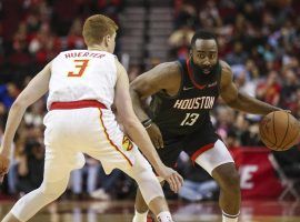 James Harden of the Houston Rockets drives by Atlanta Hawks shooting guard Kevin Huerter at State Farm Arena in Atlanta, GA. (Image: Troy Taormina/USA Today Sports)