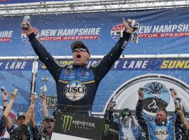 Kevin Harvick celebrates after winning the Foxwoods Resort Casino 301 at New Hampshire Motor Speedway on Sunday. (Image: Mary Schwalm/AP)