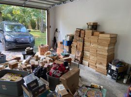 My garage after unloading my 1 million card find. It's unclear when I will park my car in here again. (Image: Johnny Kampis)