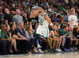 Jayson Tatum from the Boston Celtics shushes the crowd at Fiserv Center after he knocks down a 3-pointer in a Game 6 victory against the Milwaukee Bucks. (Image: Dustin B. Aggy)