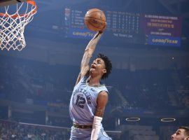 Memphis Grizzlies rookie PG, Ja Morant, soars for a slam dunk against the Cleveland Cavaliers in December 2019 in Memphis. (Image: David Liam Kyle/Getty)