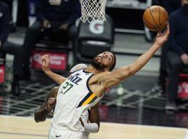 Rudy Gobert, the favorite to win the NBA DPOY, pulls down a rebound for the Utah Jazz against the LA Clippers. (Image: Marcio Jose Sanchez/AP)