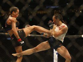 Joanna Jedrzejczyk (left) wants a title shot after defeating Michelle Waterson (right) on Saturday night. (Image: Reinhold Matay/USA Today Sports)