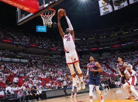 Jimmy Butler from the Miami Heat elevates for a dunk against the Philadelphia 76ers in the Western Conference Semifinals. (Image: Jesse D. Garrabrant/Getty)