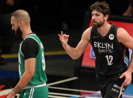 Joe Harris of the Brooklyn Nets celebrates one of his seven 3-point shots during a blow out in Game 2 against the Boston Celtics at Barclays Arena. (Image: Brad Penner/USA Today Sports)