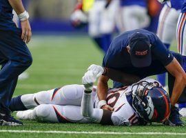 Denver Broncos wide receiver Jerry Jeudy grimacing in pain after an ankle injury in the second half against the New York Giants at MetLife Stadium in East Rutherford, NJ. (Image: Matt Rourke/AP)