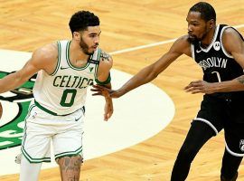 Jayson Tatum from the Boston Celtics is defended by Kevin Durant of the Brooklyn Nets during h regular season. (Image: Brian Fluharty/USA Today Sports)