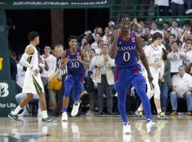 Kansas guard Marcus Garrett (0) celebrates a big win over #1 Baylor at Ferrell Center in Waco, TX. (Image: Kevin Jairaj/USA Today Sports)