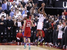 Kawhi Leonard of the Toronto Raptors takes a shot as time expires over Joel Embiid of the Philly Sixers at Scotiabank Arena in Toronto, Canada. (Image: Charles Fox/Philly.com)