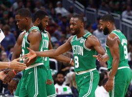 Kemba Walker and Boston teammates gather at the sidelines during a time out against the Orlando Magic. (Image: Kim Klement/USA Today Sports)