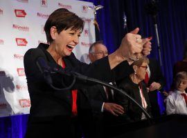 Gov. Kim Reynolds signed a bill on Monday that will allow sports betting in Iowa. (Image: Charlie Neibergall/AP)