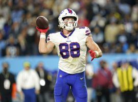 Buffalo Bills tight end Dawson Knox rears back for a pass against the Tennessee Titans immediately after he incurred a hand injury. (Image: Mychal Lawson/Getty)