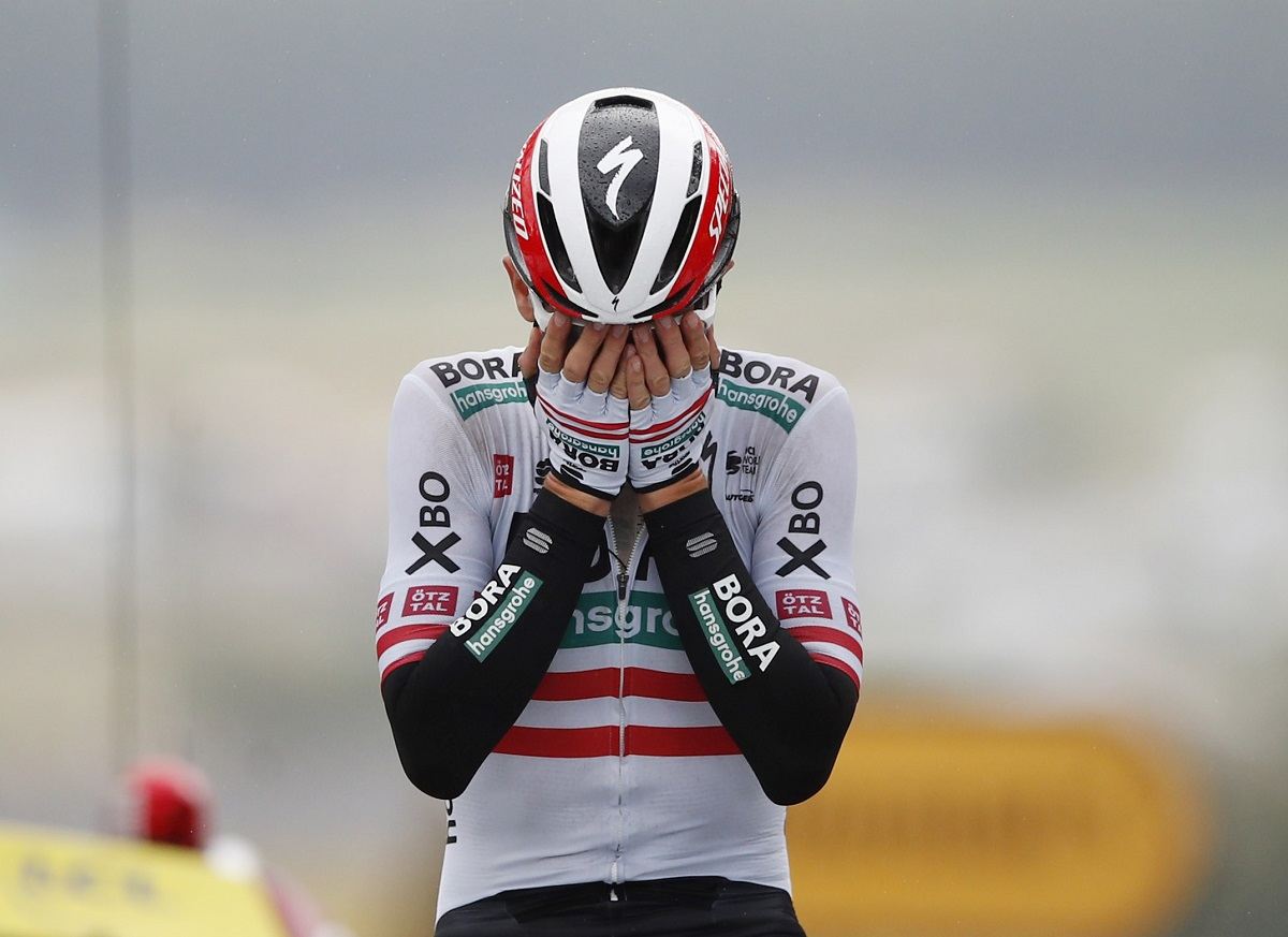 An emotional Patrick Konrad (Bora-Hansgrohe) survived the dangerous descent at Col de Portet d'Aspet to win Stage 16 of the Tour de France. (Image: Stephane Mahe/Reuters)