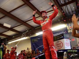 Kyle Busch celebrates following his victory in the Overton’s 400 at Chicagoland Speedway on Sunday. It was Busch’s fifth win on the 2018 NASCAR Cup Series season. (Image: Getty)